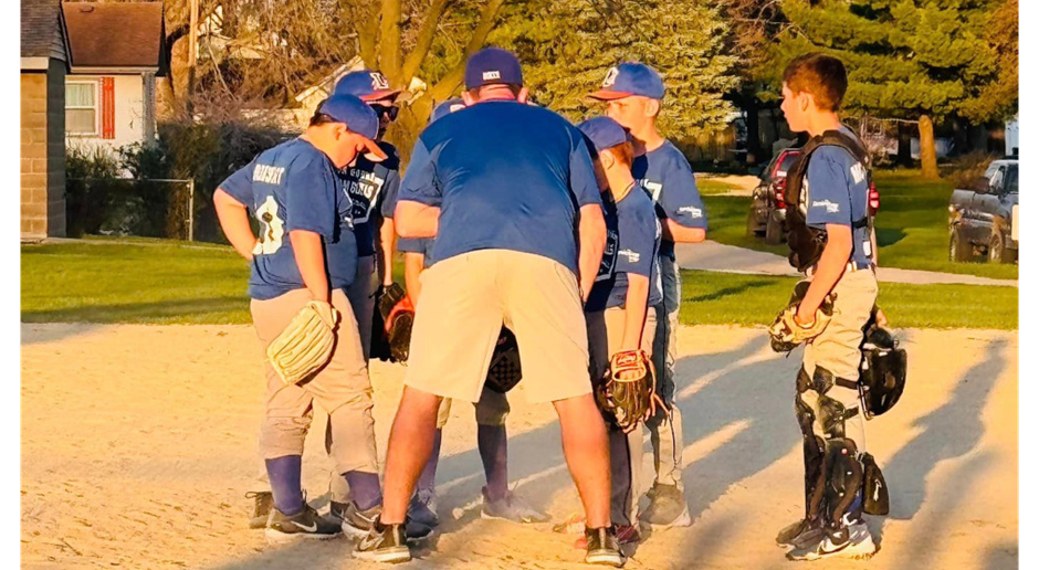 PG Lions Club North Boone Youth Baseball Team Huddle