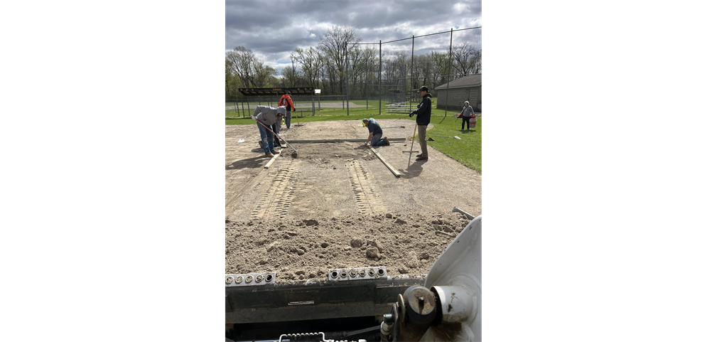 Community members working together for the Youth Baseball programs