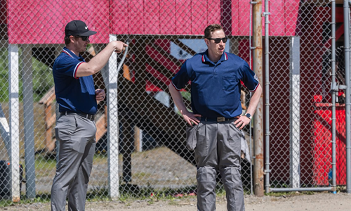 Umpires Blaine and Kenneth Wilson.